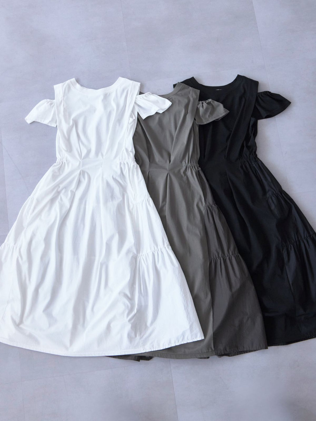 overE オフショル付きティアードTシャツワンピース ブラック 完売 overE オフショル付きティアードTシャツワンピース ブラック
